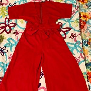 New Red jumpsuit. Never worn.